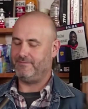 Backing vocalist — left: Role in the shared video
